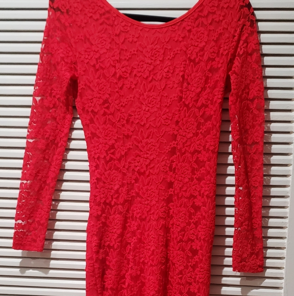 Beautiful red long lace dress  👗 has a little of stretch.  Size small.